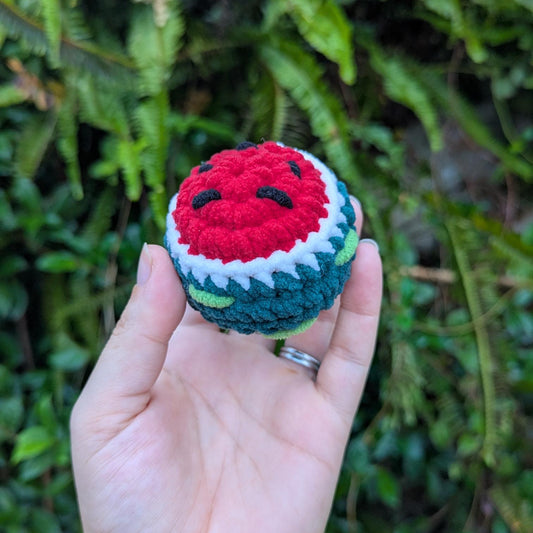A round crocheted watermelon