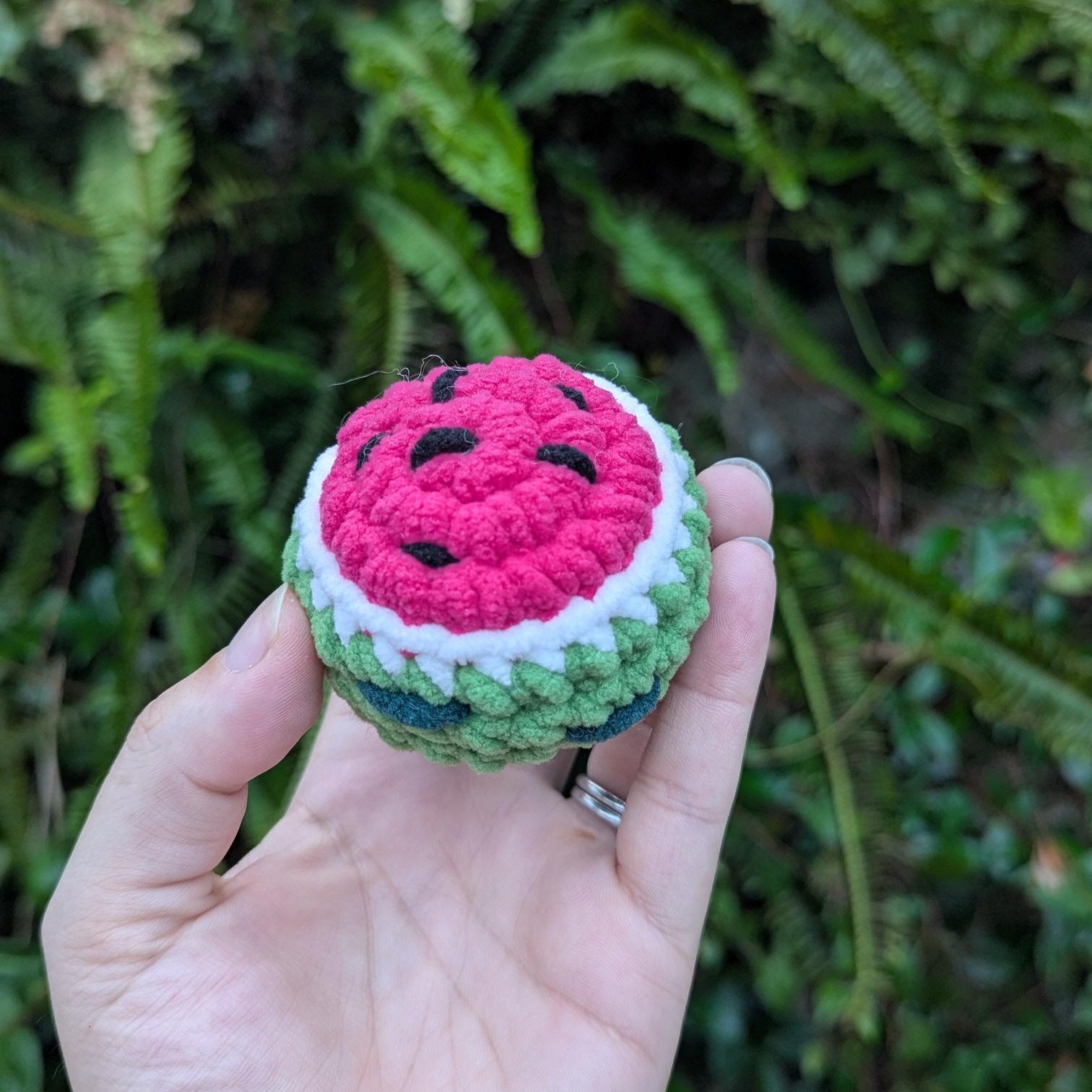 A round crocheted watermelon