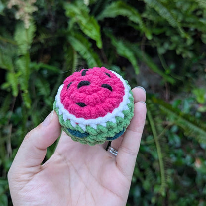 A round crocheted watermelon