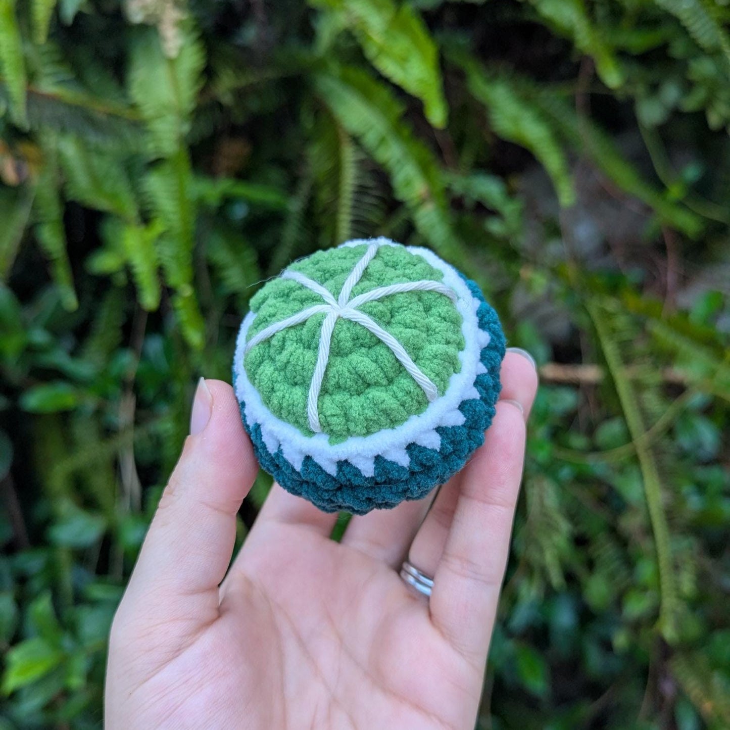 A round crocheted lime